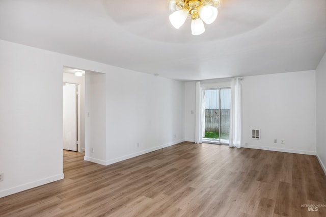 228 N Latah St, Boise, ID 83706 - unfurnished room with wood finished floors and ceiling fan