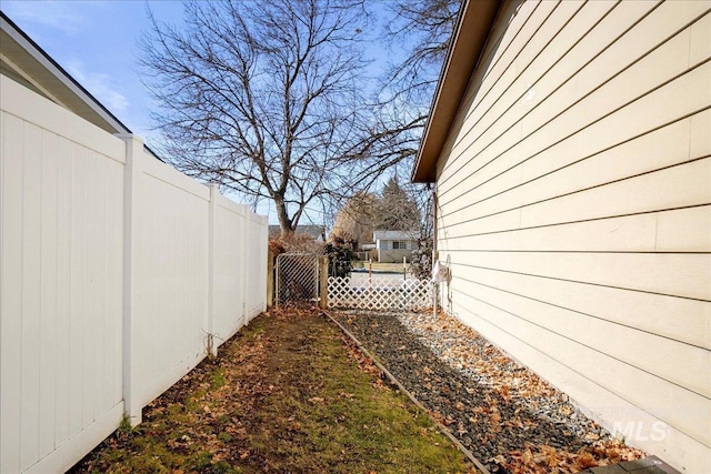 view of yard featuring fence