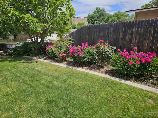 view of yard featuring fence