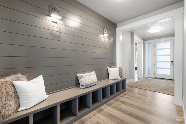 mudroom with wood finished floors
