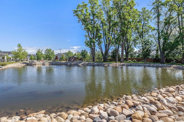 property view of water with fence