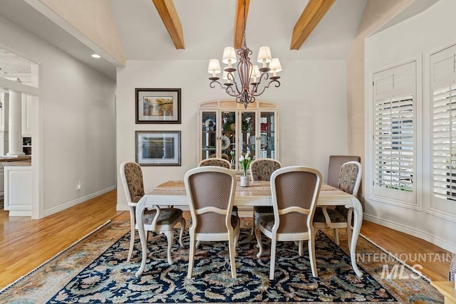 4119 N Park Ln, Eagle, ID 83616 - dining area featuring a chandelier, light wood-type flooring, beamed ceiling, and recessed lighting
