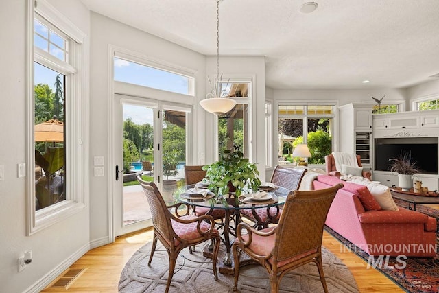 4119 N Park Ln, Eagle, ID 83616 - dining room with healthy amount of natural light and light wood finished floors