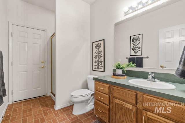 4119 N Park Ln, Eagle, ID 83616 - bathroom featuring brick patterned floors, vanity, and a stall shower