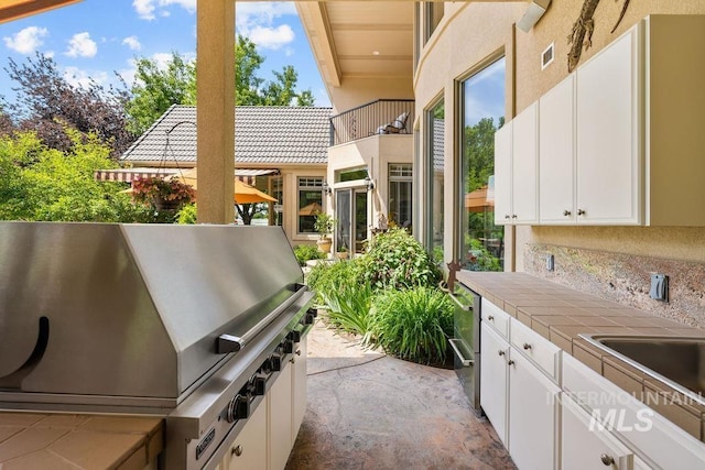 4119 N Park Ln, Eagle, ID 83616 - patio / terrace with exterior kitchen and a sink