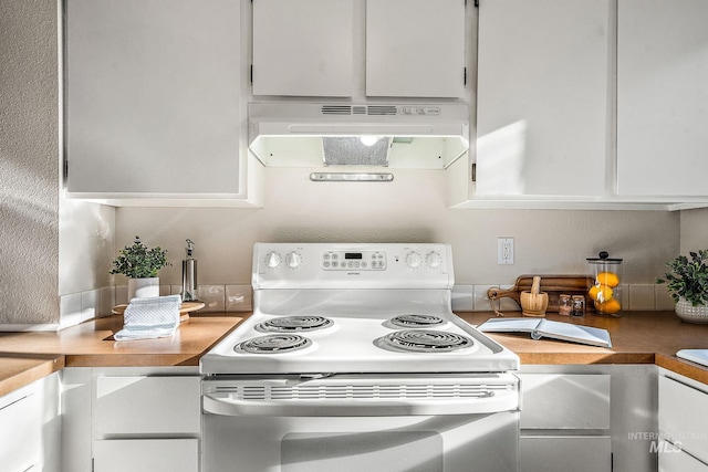 kitchen with white cabinetry, white electric range, and exhaust hood