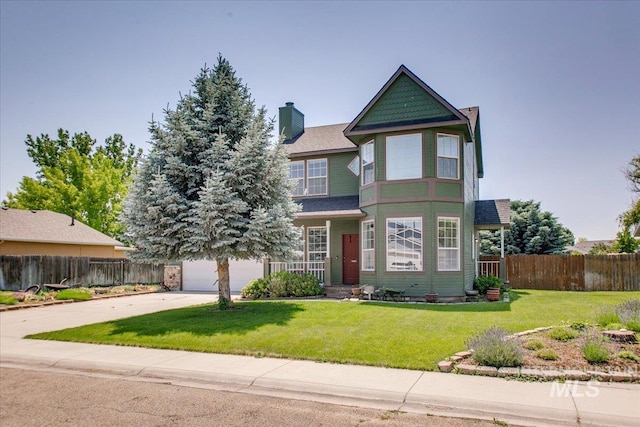 1239 Willow Creek Dr, Nampa, ID 83686 - victorian home featuring driveway, a garage, and a chimney