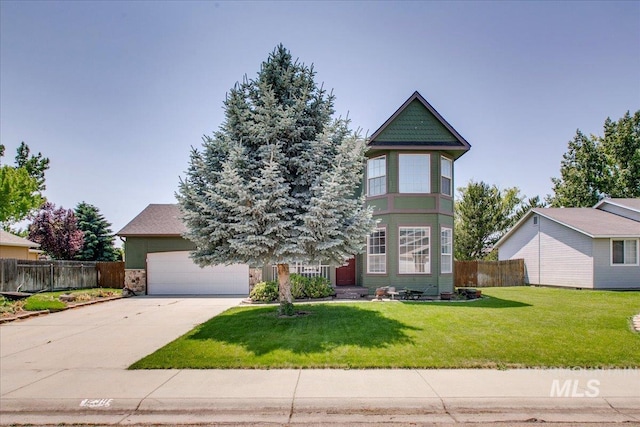 1239 Willow Creek Dr, Nampa, ID 83686 - victorian home featuring concrete driveway and an attached garage