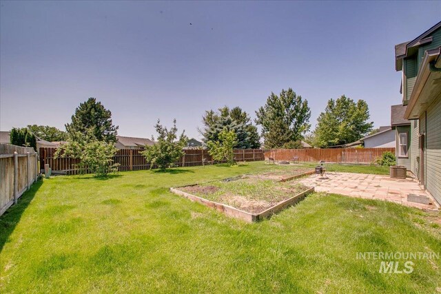 1239 Willow Creek Dr, Nampa, ID 83686 - view of yard featuring a patio and cooling unit