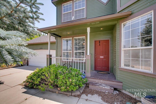 1239 Willow Creek Dr, Nampa, ID 83686 - doorway to property featuring a porch and driveway