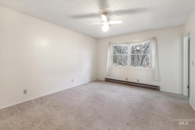 empty room featuring ceiling fan, carpet, a textured ceiling, and baseboard heating