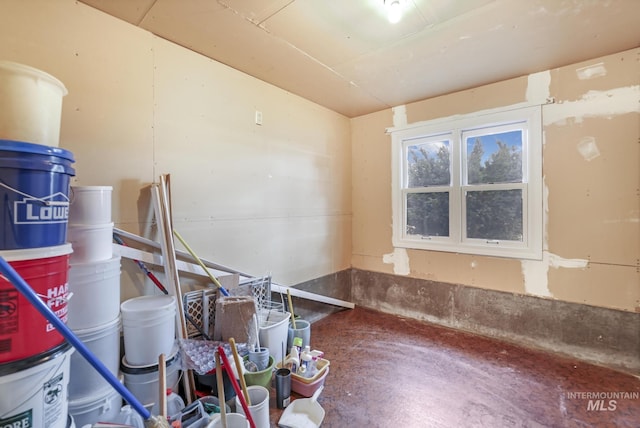 misc room with concrete flooring