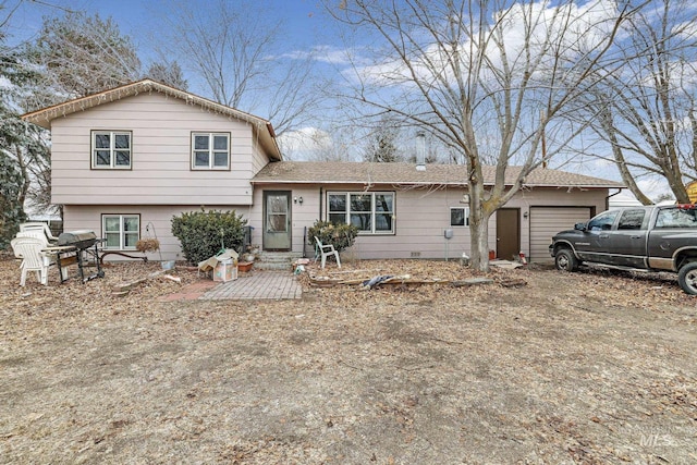 tri-level home with a garage