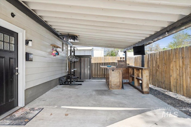 view of patio / terrace with fence