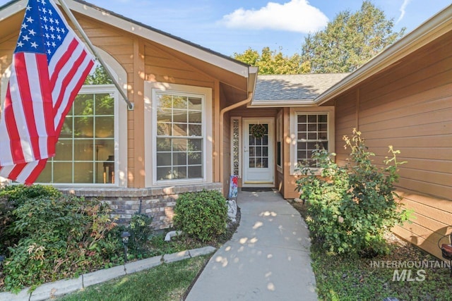 1548 N Vineyards Ave, Meridian, ID 83642 - view of exterior entry featuring roof with shingles