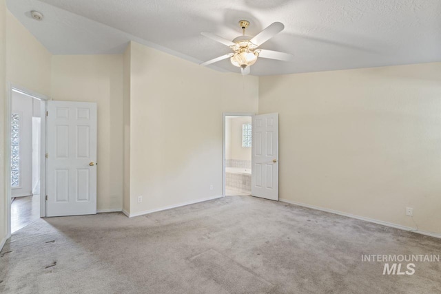 1548 N Vineyards Ave, Meridian, ID 83642 - carpeted spare room featuring a ceiling fan and baseboards