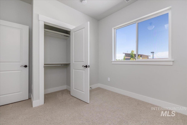 1438 N Cole Cottage Ln, Boise, ID 83704 - unfurnished bedroom with carpet flooring, baseboards, and a closet