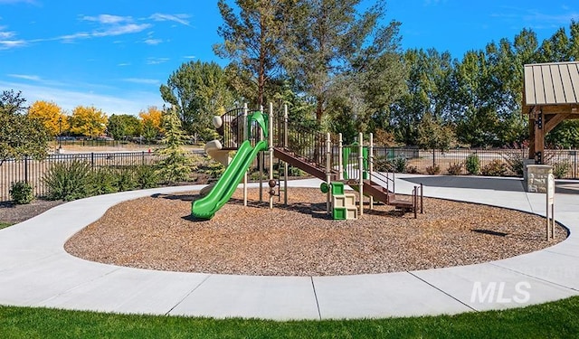 community jungle gym with fence