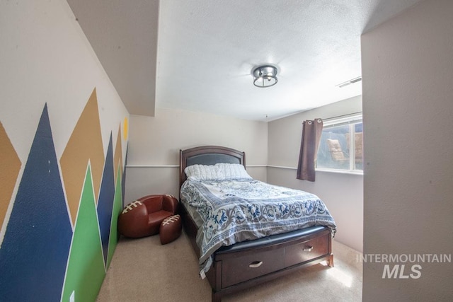 bedroom featuring visible vents and carpet
