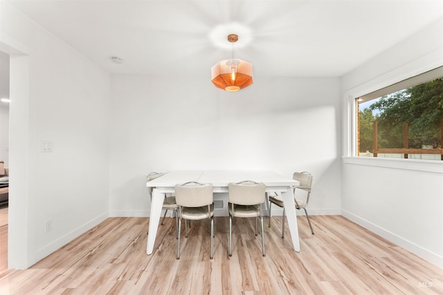 1600 E Victory Rd, Boise, ID 83706 - dining area featuring wood finished floors and baseboards