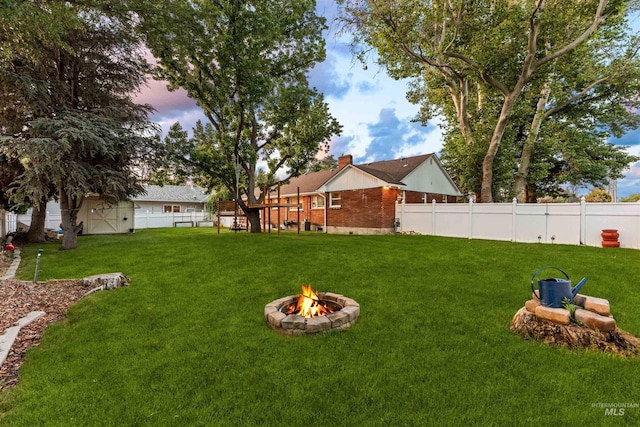 1600 E Victory Rd, Boise, ID 83706 - view of yard with a fire pit