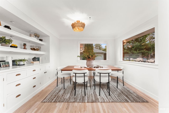 1600 E Victory Rd, Boise, ID 83706 - dining area featuring light wood finished floors and baseboards