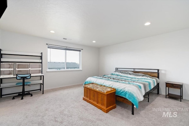 bedroom featuring recessed lighting, carpet, visible vents, and baseboards