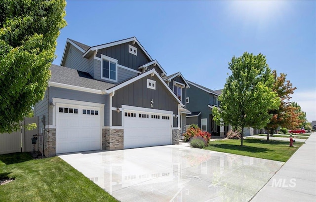 1123 Drexel Hill Ave, Caldwell, ID 83605 - craftsman inspired home with board and batten siding, driveway, a garage, and a front yard