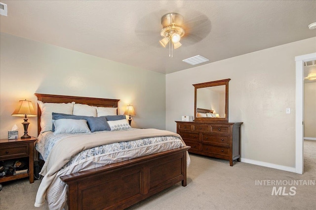 1123 Drexel Hill Ave, Caldwell, ID 83605 - bedroom featuring light colored carpet, baseboards, and ceiling fan