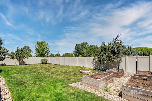 1123 Drexel Hill Ave, Caldwell, ID 83605 - view of yard with a vegetable garden
