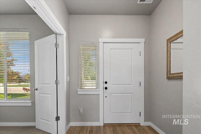 1123 Drexel Hill Ave, Caldwell, ID 83605 - foyer entrance with baseboards and wood finished floors