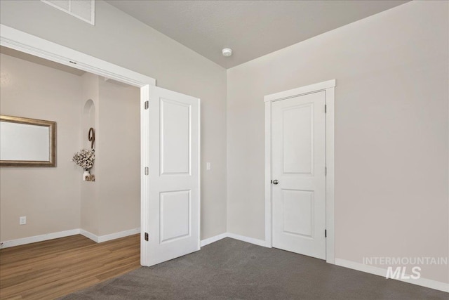 1123 Drexel Hill Ave, Caldwell, ID 83605 - unfurnished bedroom featuring baseboards and dark wood-style floors