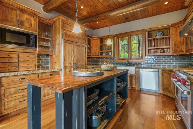 370 Blackhawk Lake Dr, Mccall, ID 83638 - kitchen with open shelves, butcher block countertops, built in appliances, a sink, and wooden ceiling with exposed beams