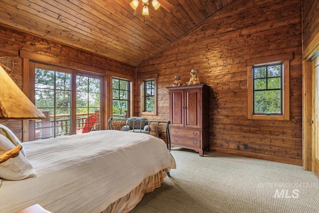 370 Blackhawk Lake Dr, Mccall, ID 83638 - bedroom featuring lofted ceiling, carpet floors, wooden walls, access to outside, and wooden ceiling