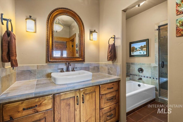 370 Blackhawk Lake Dr, Mccall, ID 83638 - bathroom with vanity, a bath, a stall shower, and tile patterned floors
