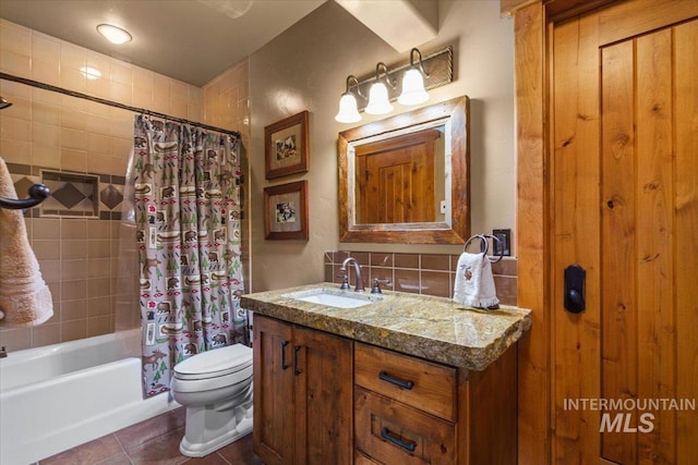 370 Blackhawk Lake Dr, Mccall, ID 83638 - bathroom with toilet, tile patterned floors, vanity, and shower / bath combination with curtain