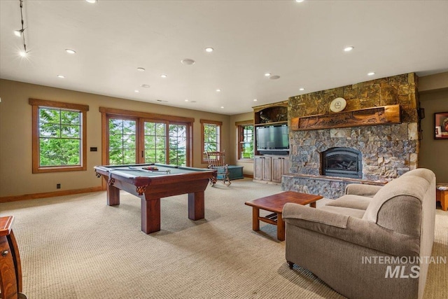 370 Blackhawk Lake Dr, Mccall, ID 83638 - game room featuring pool table, light colored carpet, recessed lighting, a stone fireplace, and baseboards