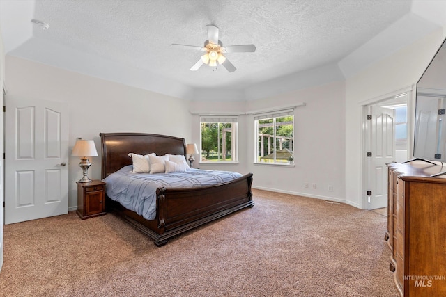 4019 E Man O War Dr, Nampa, ID 83686 - bedroom featuring light colored carpet, a textured ceiling, and a ceiling fan