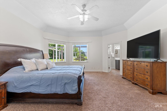 4019 E Man O War Dr, Nampa, ID 83686 - bedroom with carpet floors, a textured ceiling, ceiling fan, and ensuite bath