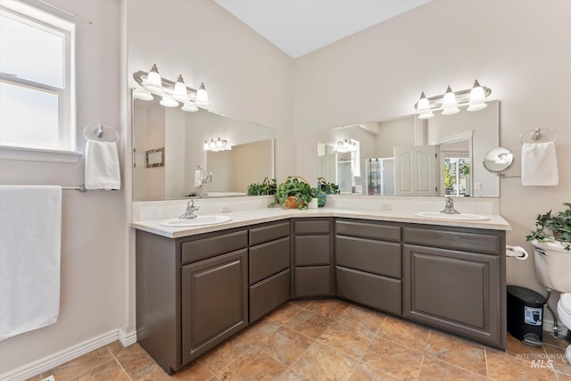4019 E Man O War Dr, Nampa, ID 83686 - bathroom with double vanity and an enclosed shower