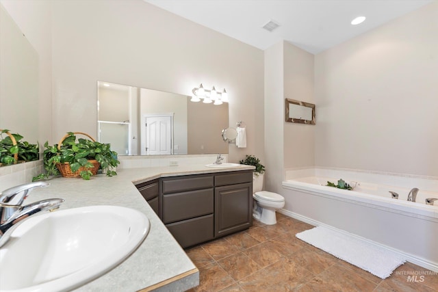 4019 E Man O War Dr, Nampa, ID 83686 - bathroom with a garden tub, double vanity, and a stall shower