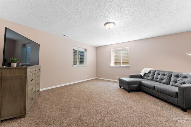 4019 E Man O War Dr, Nampa, ID 83686 - living room with light carpet and a textured ceiling