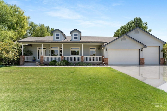 4019 E Man O War Dr, Nampa, ID 83686 - view of front of property with an attached garage, a front lawn, a porch, and driveway