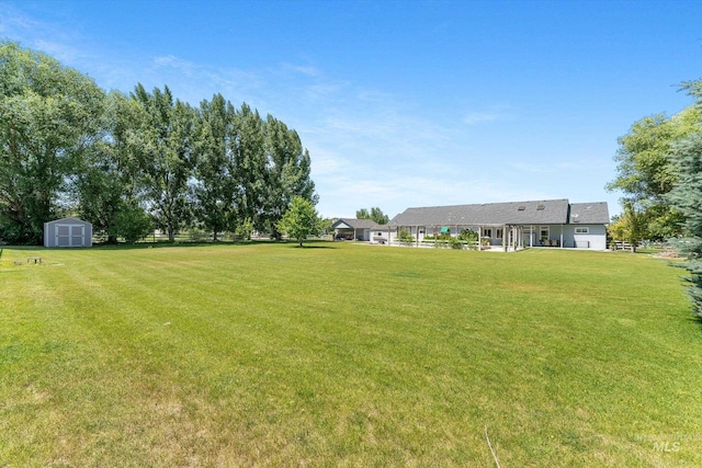 4019 E Man O War Dr, Nampa, ID 83686 - view of green lawn with a storage unit