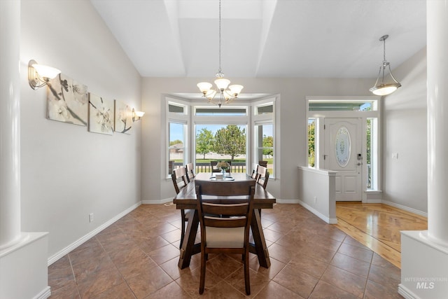 4019 E Man O War Dr, Nampa, ID 83686 - dining space featuring vaulted ceiling and a chandelier