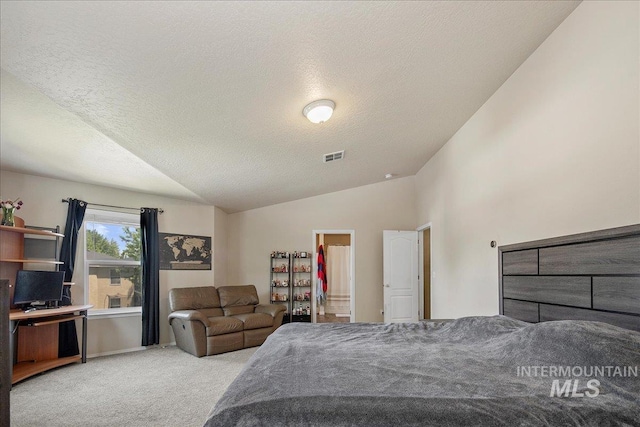 9308 W Rustica Dr, Boise, ID 83709 - bedroom with carpet floors, lofted ceiling, a textured ceiling, and a walk in closet