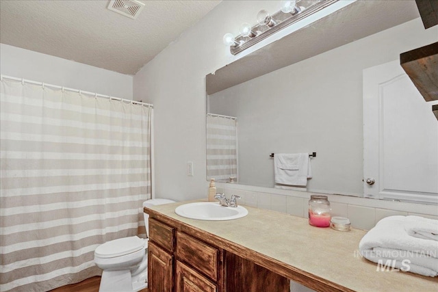 9308 W Rustica Dr, Boise, ID 83709 - bathroom featuring vanity, a textured ceiling, and a shower with shower curtain