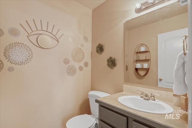 9308 W Rustica Dr, Boise, ID 83709 - half bathroom with toilet and vanity