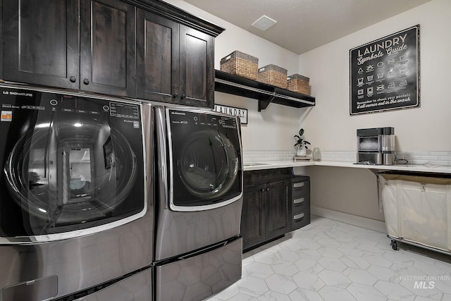 2245 N Burnam Ave, Star, ID 83669 - laundry area featuring cabinet space and washing machine and dryer