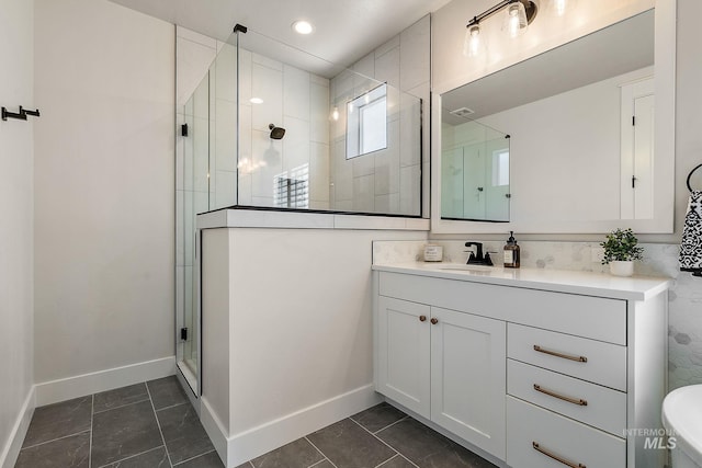 2245 N Burnam Ave, Star, ID 83669 - full bathroom featuring baseboards, tiled shower, tile patterned flooring, and vanity